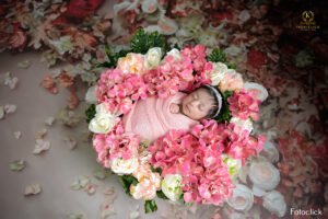 newborn photo with flower