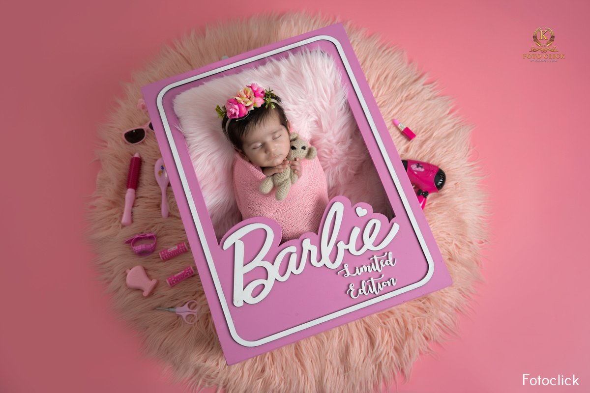 newborn baby in a Barbie Box